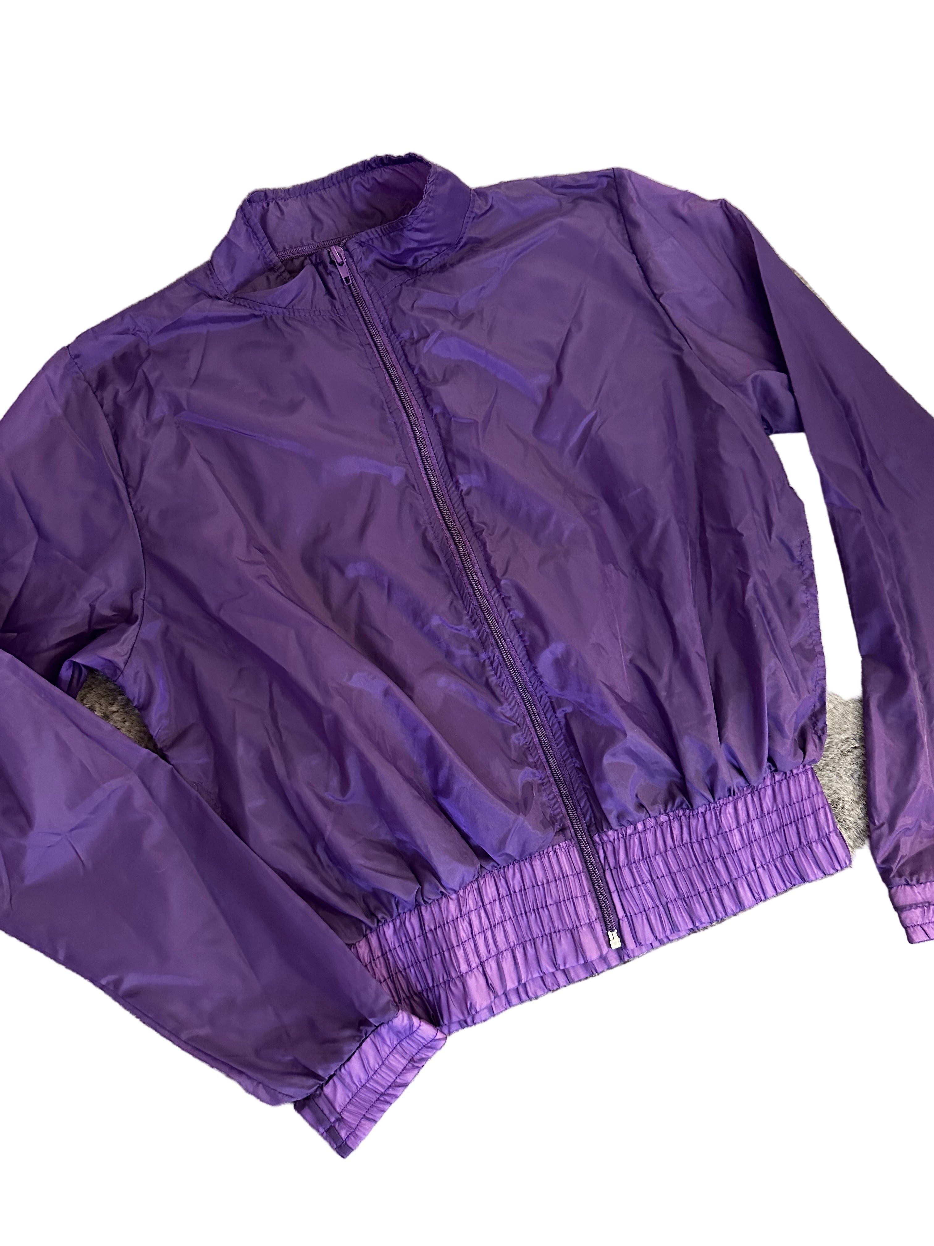 Corta vento roxo transparente