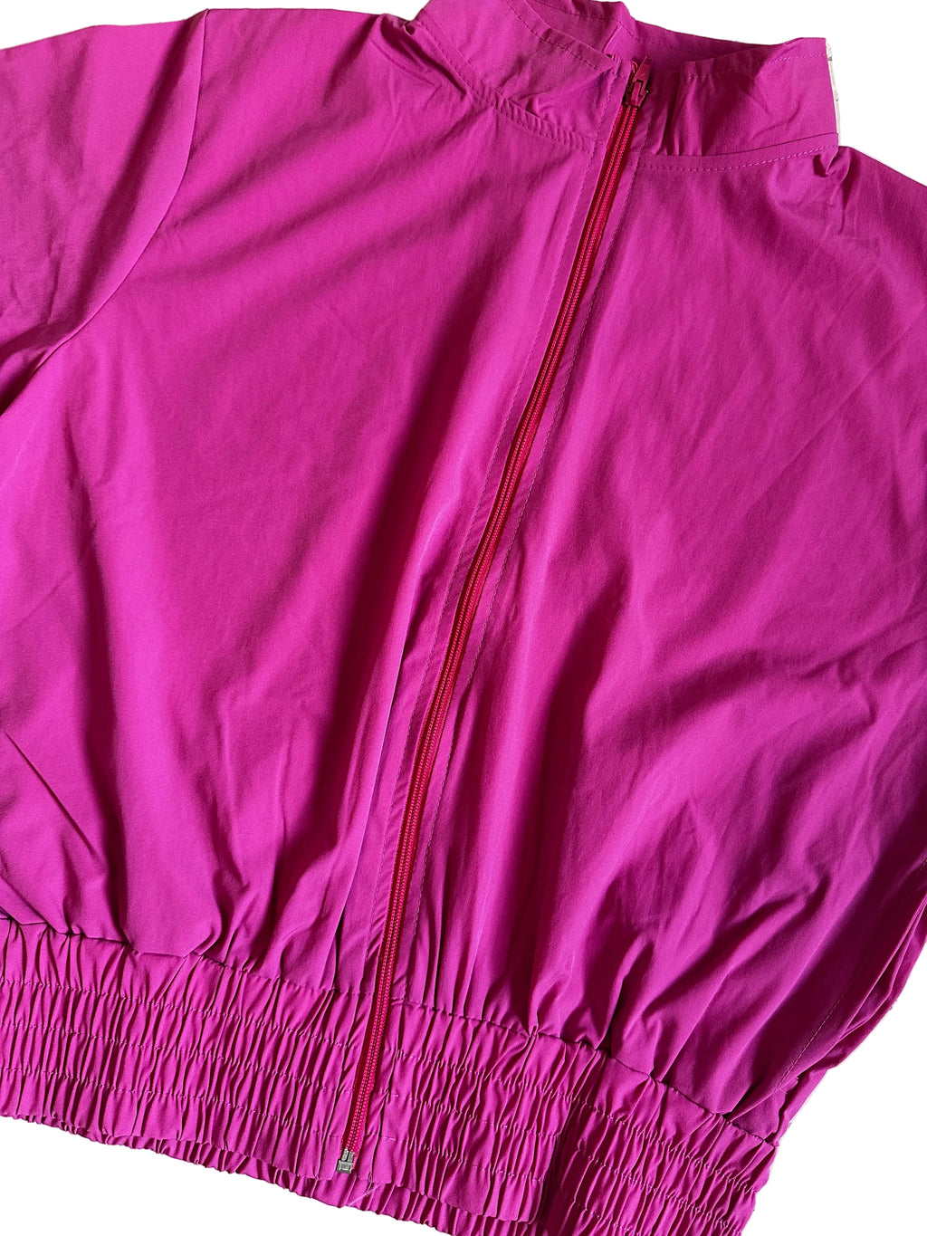 Corta vento rosa forte