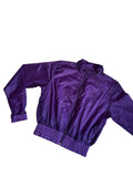 Corta vento roxo transparente
